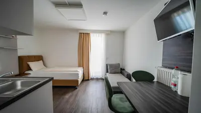 Ein Bett oder Betten in einem Zimmer der Unterkunft Comfort Boardinghouse