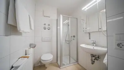Ein Badezimmer in der Unterkunft Comfort Boardinghouse