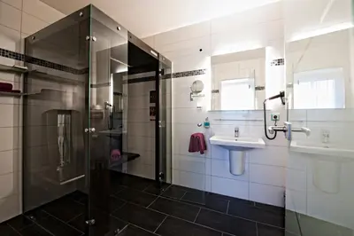Ein Badezimmer in der Unterkunft Hotel Jungstil