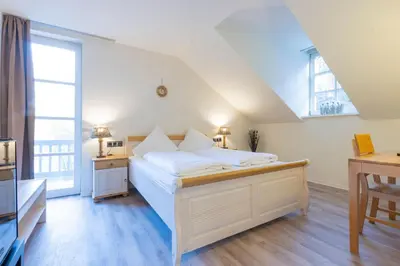 Ein Bett oder Betten in einem Zimmer der Unterkunft Hotel Blechhammer