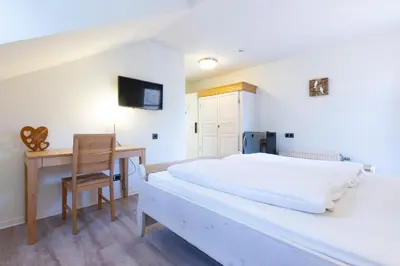 Ein Bett oder Betten in einem Zimmer der Unterkunft Hotel Blechhammer