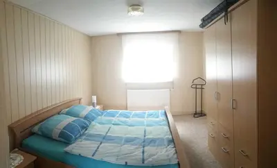 Ein Bett oder Betten in einem Zimmer der Unterkunft Bergblick