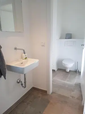 Ein Badezimmer in der Unterkunft Quartier 