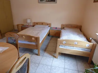 Ein Bett oder Betten in einem Zimmer der Unterkunft Ferienwohnung Wendt