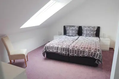 Ein Bett oder Betten in einem Zimmer der Unterkunft Kalles Heimat