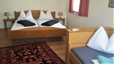 Ein Bett oder Betten in einem Zimmer der Unterkunft Hotel Janssen