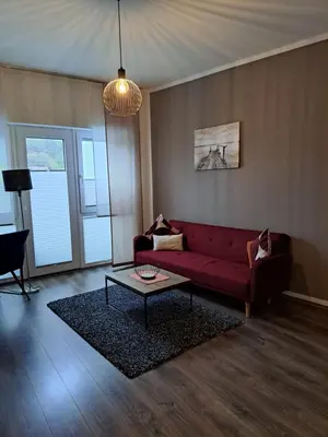 Ein Sitzbereich in der Unterkunft Aulbach' s Appartments