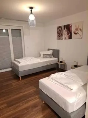 Ein Bett oder Betten in einem Zimmer der Unterkunft Aulbach' s Appartments