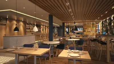 Ein Restaurant oder anderes Speiselokal in der Unterkunft Holiday Inn Express Frankfurt Airport - Raunheim by IHG