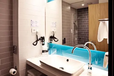 Ein Badezimmer in der Unterkunft Holiday Inn Express Frankfurt Airport - Raunheim by IHG