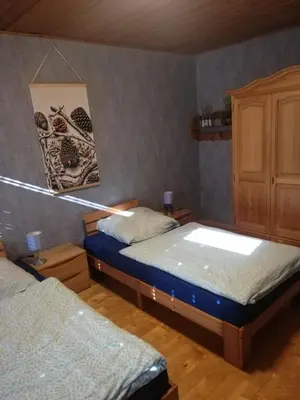 Ein Bett oder Betten in einem Zimmer der Unterkunft Ferienzimmer Saatmann