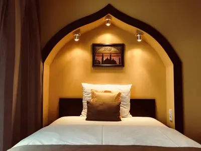 Ein Bett oder Betten in einem Zimmer der Unterkunft Hotel TraumRaum - 