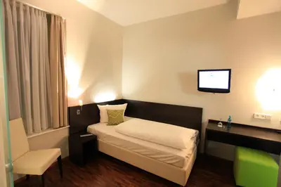 Ein Bett oder Betten in einem Zimmer der Unterkunft Art Hotel Lauterbach