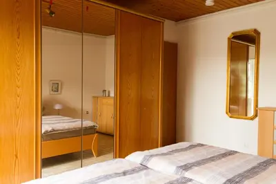 Ein Bett oder Betten in einem Zimmer der Unterkunft Apartment Muggensturm am Badesee
