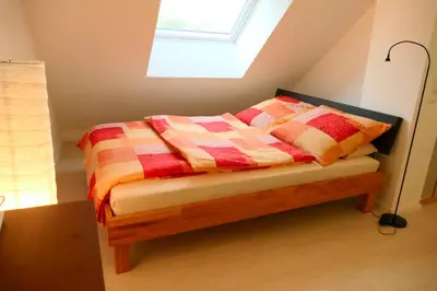Ein Bett oder Betten in einem Zimmer der Unterkunft Otterhaus