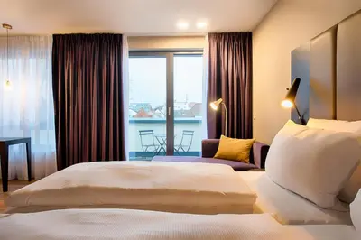 Ein Bett oder Betten in einem Zimmer der Unterkunft Welcome Hotel Neckarsulm