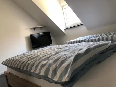 Ein Bett oder Betten in einem Zimmer der Unterkunft Traumferienwohnung 1