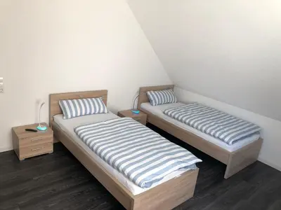 Ein Bett oder Betten in einem Zimmer der Unterkunft Traumferienwohnung 1