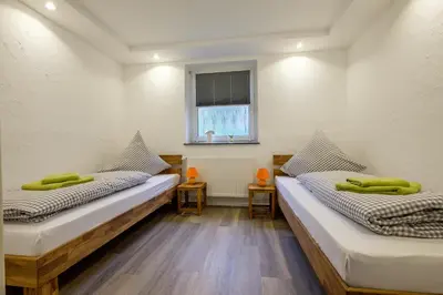 Ein Bett oder Betten in einem Zimmer der Unterkunft Ferienapartments Zwingenberg