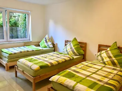 Ein Bett oder Betten in einem Zimmer der Unterkunft Ferienwohnung Sander