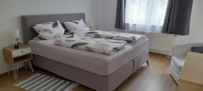 Ein Bett oder Betten in einem Zimmer der Unterkunft Ferienwohnung Christel Hirschhorn-Neckar