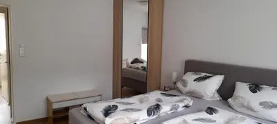 Ein Bett oder Betten in einem Zimmer der Unterkunft Ferienwohnung Christel Hirschhorn-Neckar