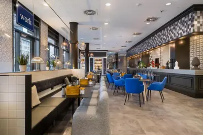Ein Sitzbereich in der Unterkunft Holiday Inn - the niu, Square Mannheim by IHG