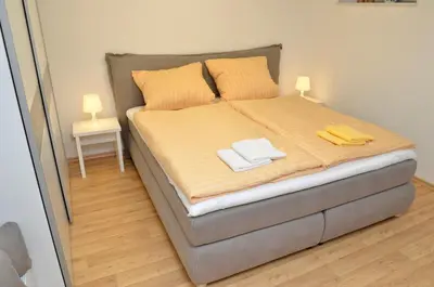 Ein Bett oder Betten in einem Zimmer der Unterkunft Ferienwohnung Uhuherz