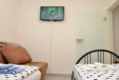 Ein Bett oder Betten in einem Zimmer der Unterkunft Ferienwohnung Uhuherz