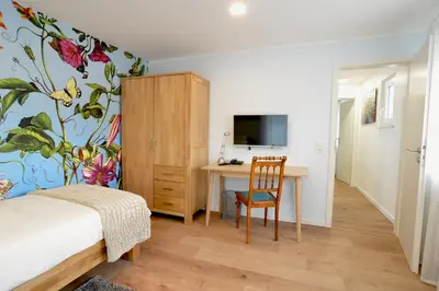 Ein Bett oder Betten in einem Zimmer der Unterkunft Gästehaus A und D Fischer