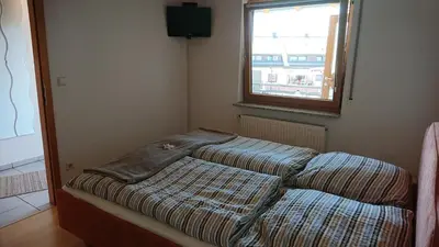 Ein Bett oder Betten in einem Zimmer der Unterkunft Gasthaus zum Löwen