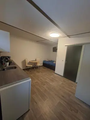 Ein Bett oder Betten in einem Zimmer der Unterkunft Apartment