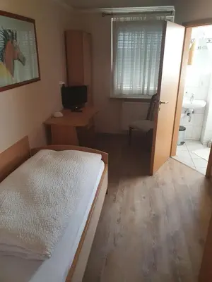 Ein Bett oder Betten in einem Zimmer der Unterkunft Restaurant-Hotel Dimitra