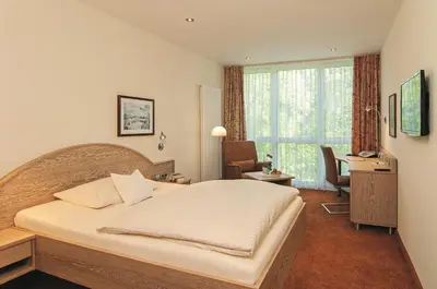 Ein Bett oder Betten in einem Zimmer der Unterkunft Häffner Bräu