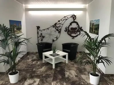 Ein Sitzbereich in der Unterkunft Hotel zum Ochsen