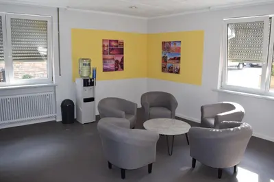 Ein Sitzbereich in der Unterkunft Hotel zum Ochsen
