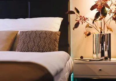 Ein Bett oder Betten in einem Zimmer der Unterkunft Hotel Eberhards am Wasser