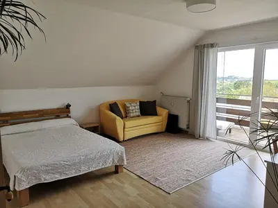 Ein Bett oder Betten in einem Zimmer der Unterkunft Ferienwohnung 