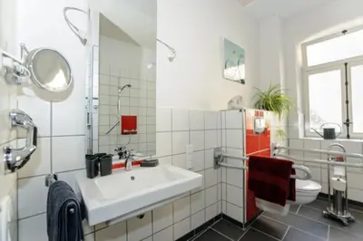 Ein Badezimmer in der Unterkunft Zwischen-Rhein-und-Reben, zentral, barrierefrei