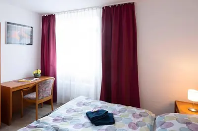 Ein Bett oder Betten in einem Zimmer der Unterkunft Bergblick Appartement