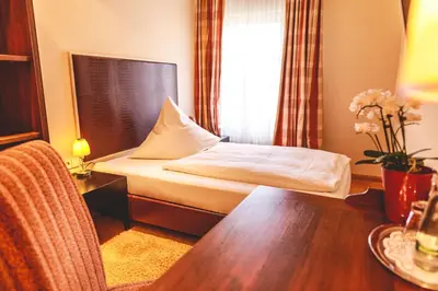 Ein Bett oder Betten in einem Zimmer der Unterkunft Hotel Löwen