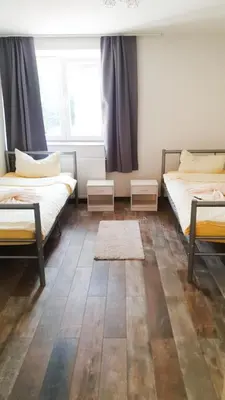 Ein Bett oder Betten in einem Zimmer der Unterkunft Villa Birkenfeld