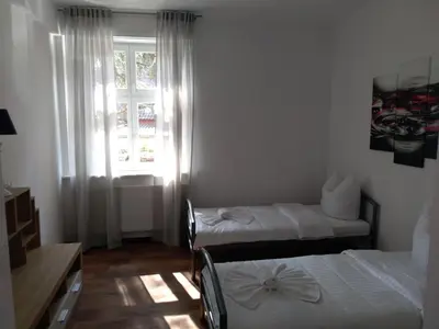 Ein Bett oder Betten in einem Zimmer der Unterkunft Villa Birkenfeld
