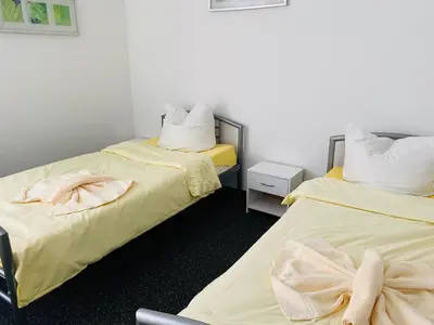 Ein Bett oder Betten in einem Zimmer der Unterkunft Villa Birkenfeld