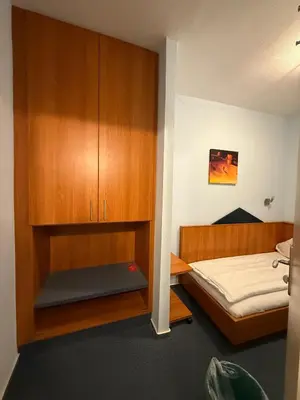 Ein Bett oder Betten in einem Zimmer der Unterkunft SVG Hotel Diversi
