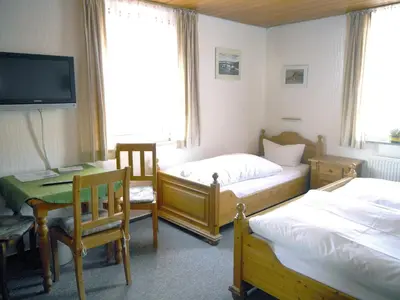 Ein Bett oder Betten in einem Zimmer der Unterkunft Hotel-Gasthof-Destille-Eisenbahn