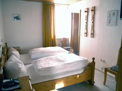 Ein Bett oder Betten in einem Zimmer der Unterkunft Hotel-Gasthof-Destille-Eisenbahn