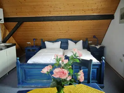 Ein Bett oder Betten in einem Zimmer der Unterkunft Hotel-Gasthof-Destille-Eisenbahn