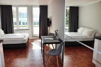 Ein Bett oder Betten in einem Zimmer der Unterkunft Hometown-Apartments