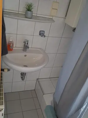 Ein Badezimmer in der Unterkunft Ferienwohnung